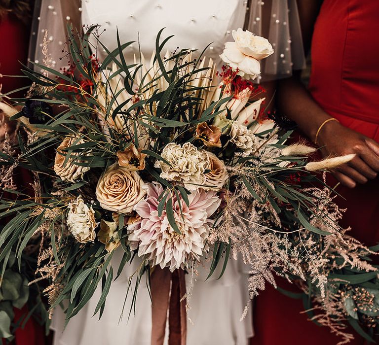 Oversized wedding bouquet with dried and fresh flowers I dusky pinks, beiges and green foliage. 