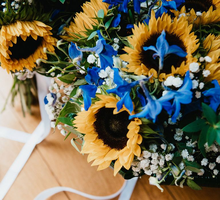 Sunflower and gypsophila with purple flower wedding bouquet