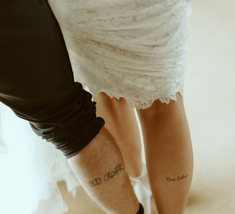 The bride and groom have matching tattoos on the back of their calves as their last name is 'calver' 