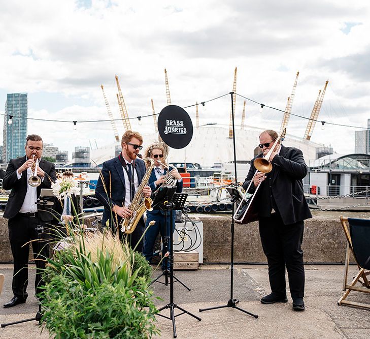 Brass band plays outdoors at Trinity Buoy Wharf 