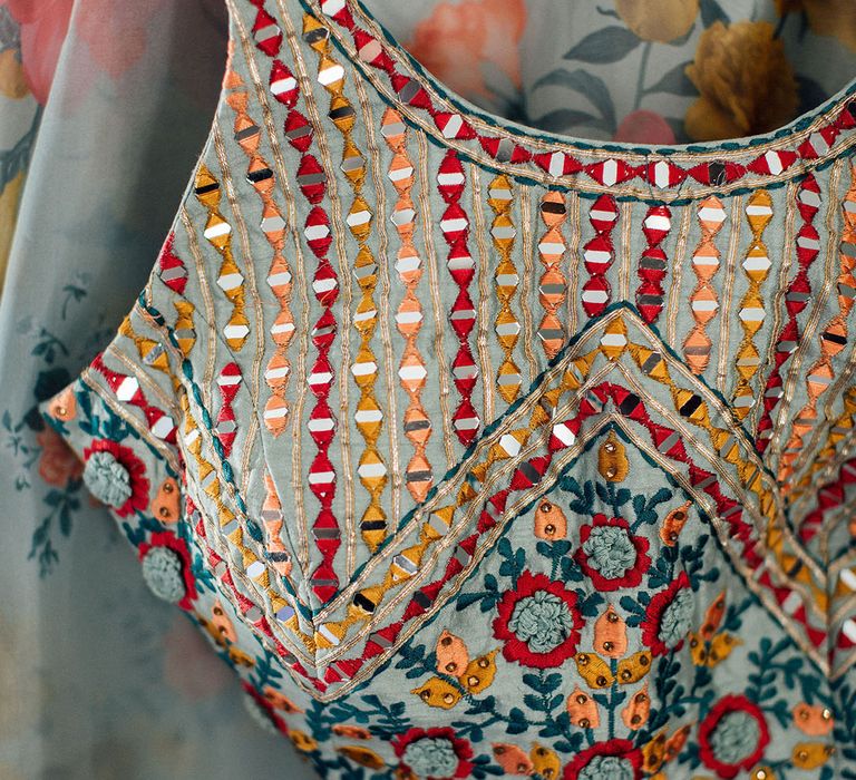 Colourful stitching across lehenga with floral detailing