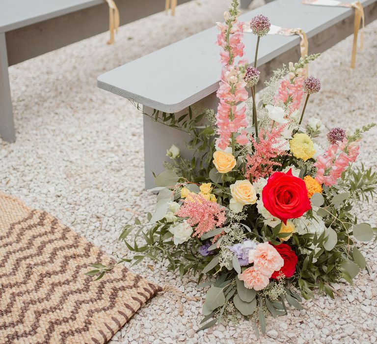 colourful aisle wedding flowers at outdoor Domaine de Blanche Fleur, Provence wedding 