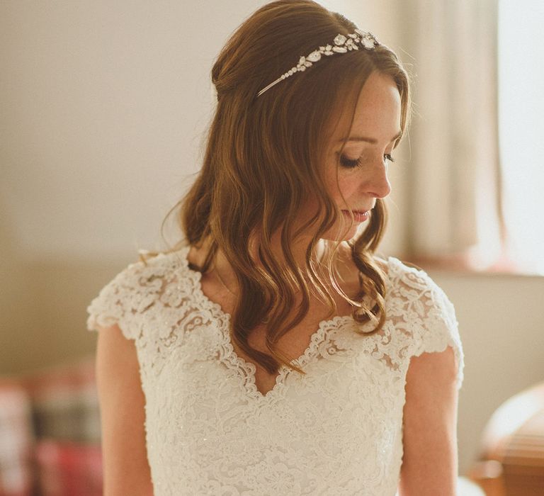 Bride in lace wedding dress for traditional wedding 