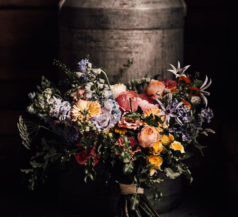 Pastel colourful wedding bouquet with wildflowers 