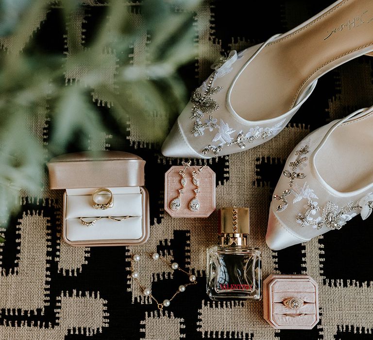 Bridal accessories with wedding shoes, bridal jewellery, wedding perfume and bouquet 