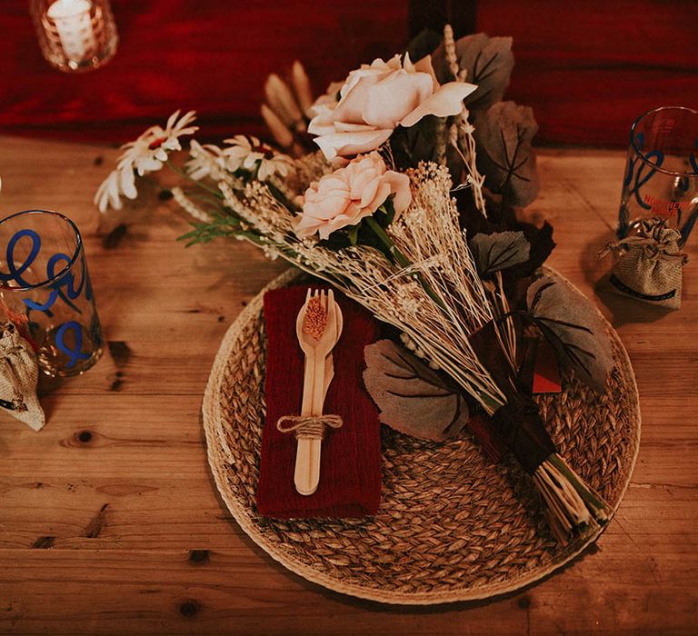  Boho place setting for industrial wedding at Thwaite Mills and Northern Monk Brewery with wooden cutlery and rose bouquet 