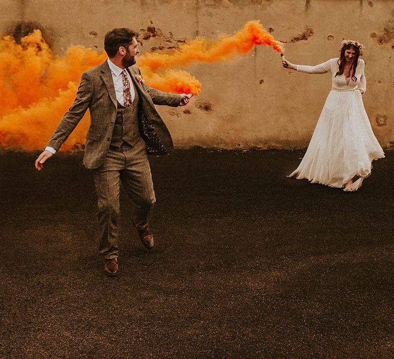 Orange smoke bombs photo idea for October autumn wedding 