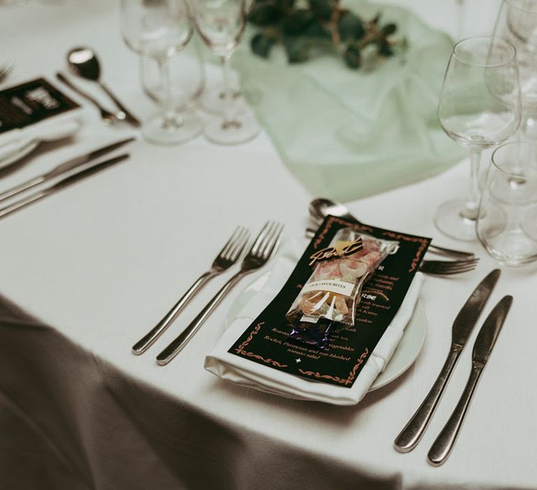 Lord of The Rings wedding place setting with wedding menu and sweets as wedding favours 