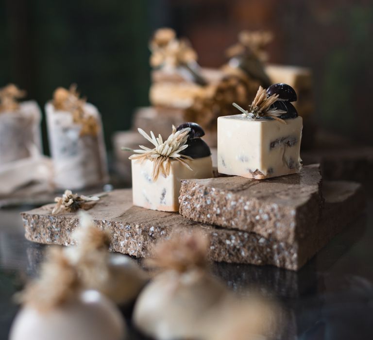 Individual cakes resting on concrete slabs 