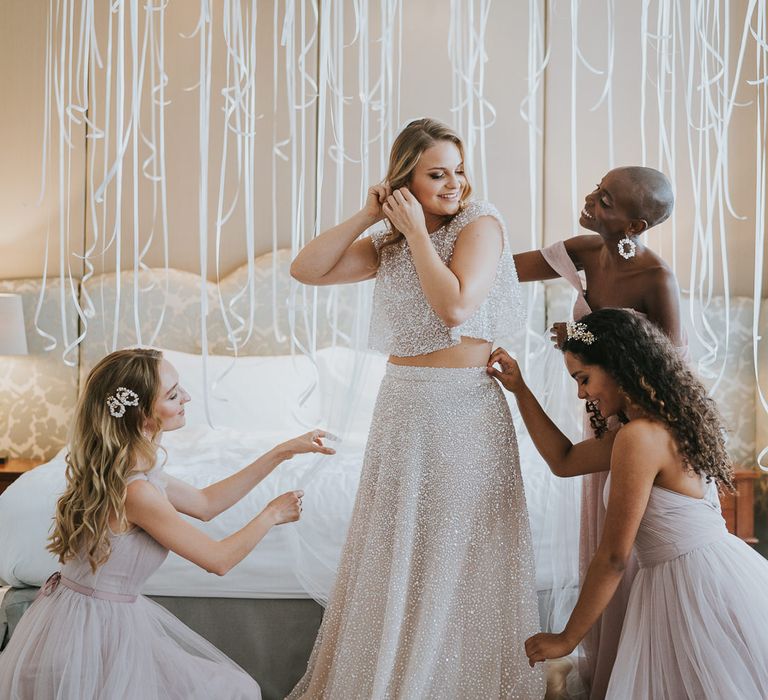 Bride in sparkly Anna Campbell separates getting ready at The Landmark London 