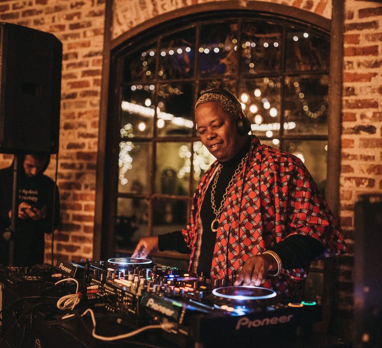 Wedding DJ with illuminating decks 