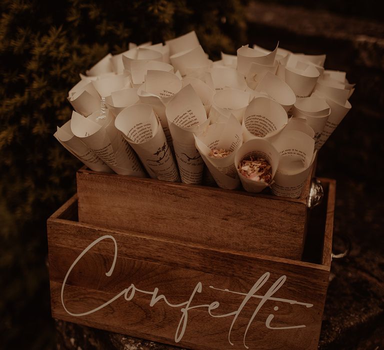 vintage book page confetti cones in a wooden box