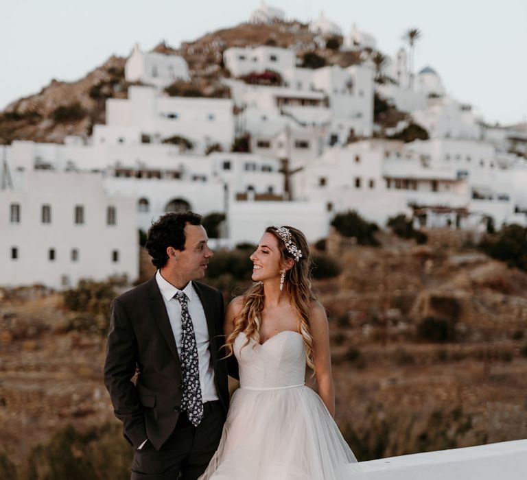 Bride & groom look lovingly at one another on their wedding day