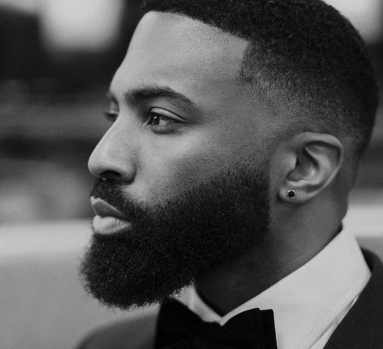 Beaded groom with a big bow tie 