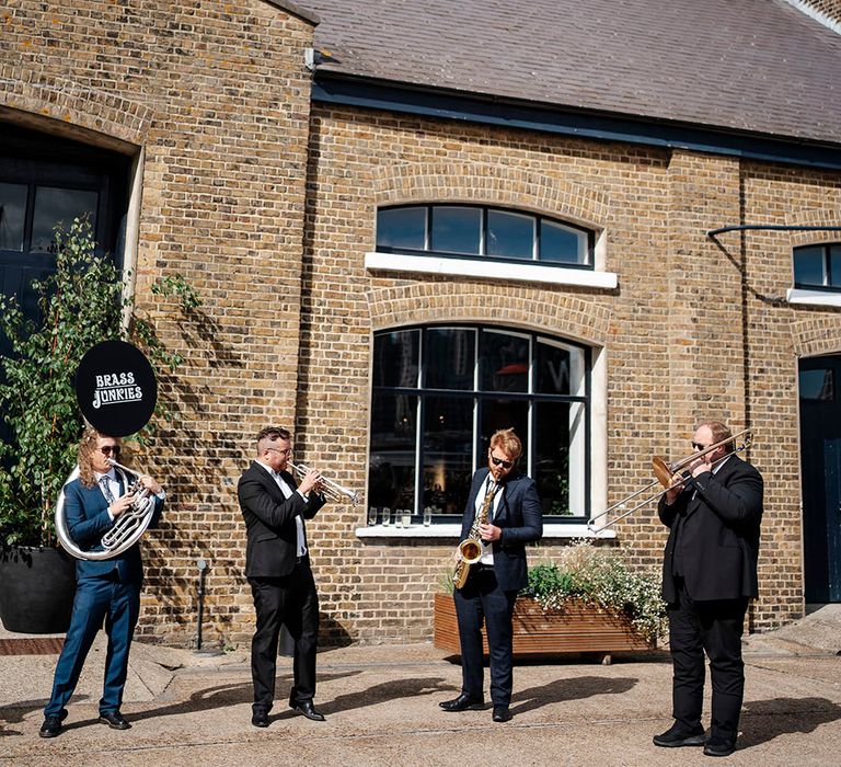 Band play outdoors at Trinity Buoy Wharf 