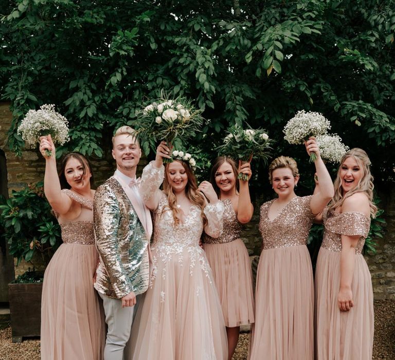 Bridal party in pale pink bodice sequin dresses