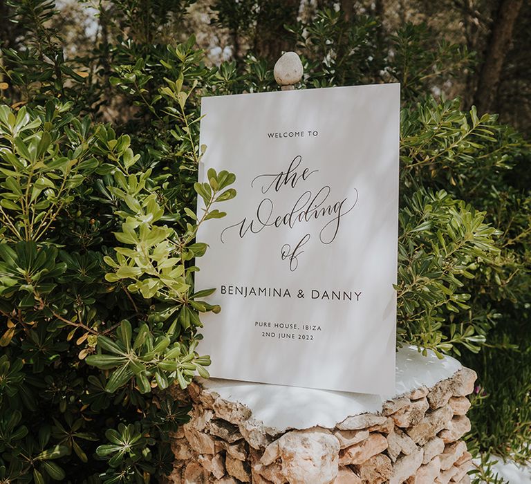 white wedding welcome sign with calligraphy font