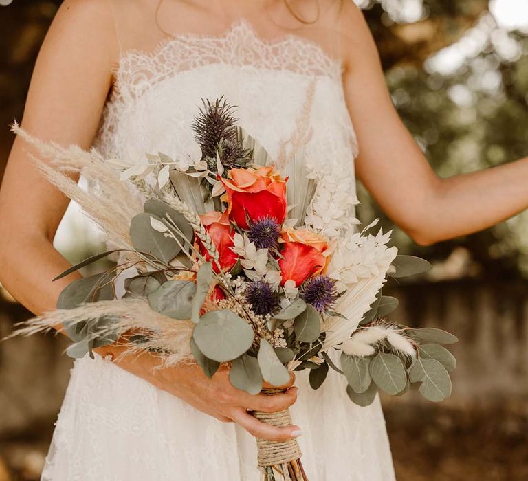 orange rose eucalyptus and pampas grass boho wedding bouquet