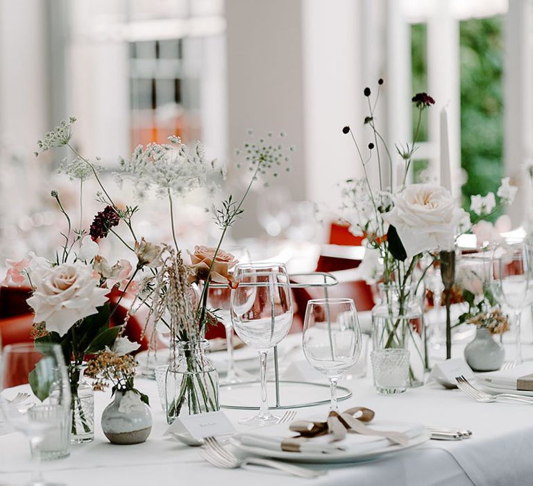 Bud vase wedding table decorations with soft neutral tones 