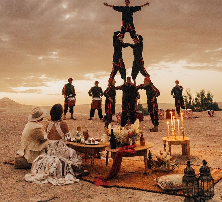 Acrobatic wedding entetrainment for luxe outdoor destination wedding 