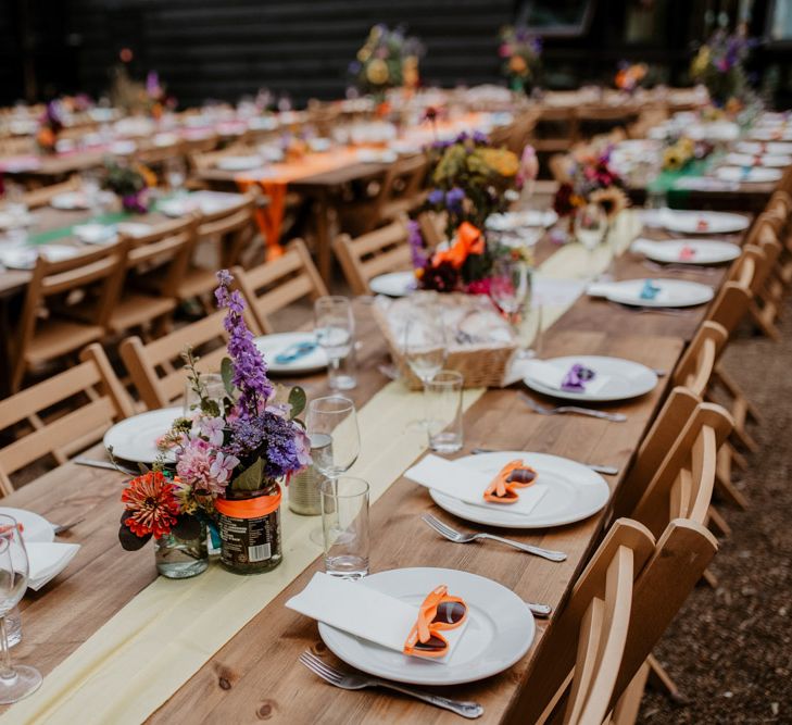 colourful wedding table decor at rainbow wedding 