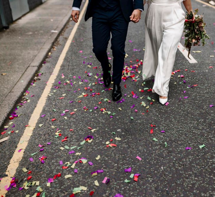 Confetti covered floor at city wedding 