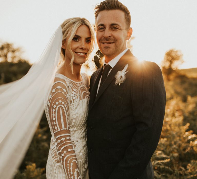 Intimate bride and groom portrait by Laura Dean Photography during golden hour 