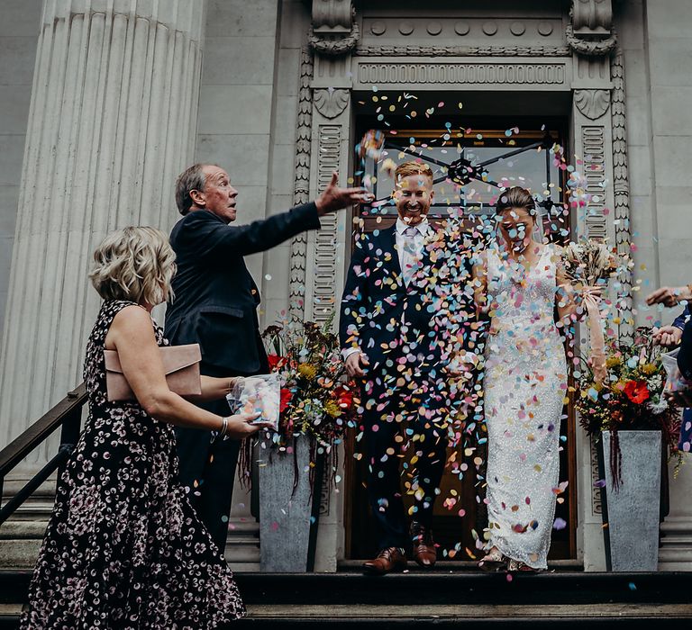 Confetti moment on the steps at Old Marylebone Town Hall