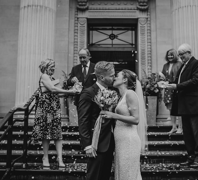 Black and white photography of the bride and groom at their Registry Office wedding 