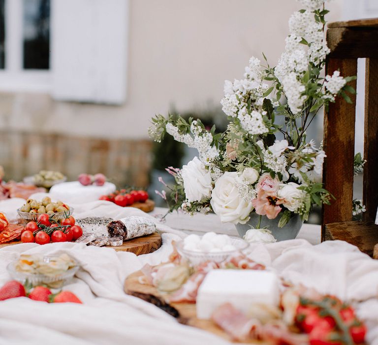 Locally sourced authentic French produce grazing table for a rustic French wedding