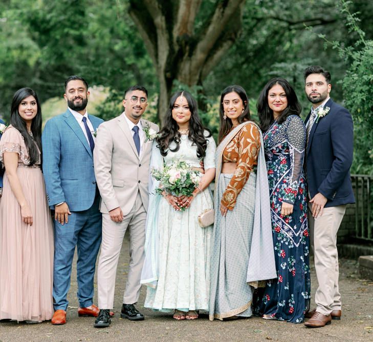 Family portrait at Sikh interfaith wedding 