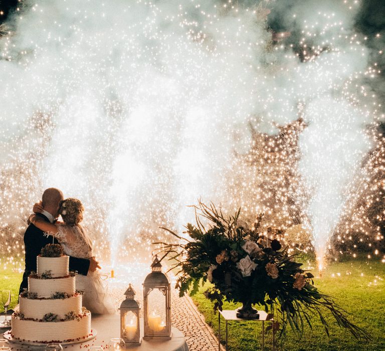 An epic sparklers fireworks display after cutting the cake