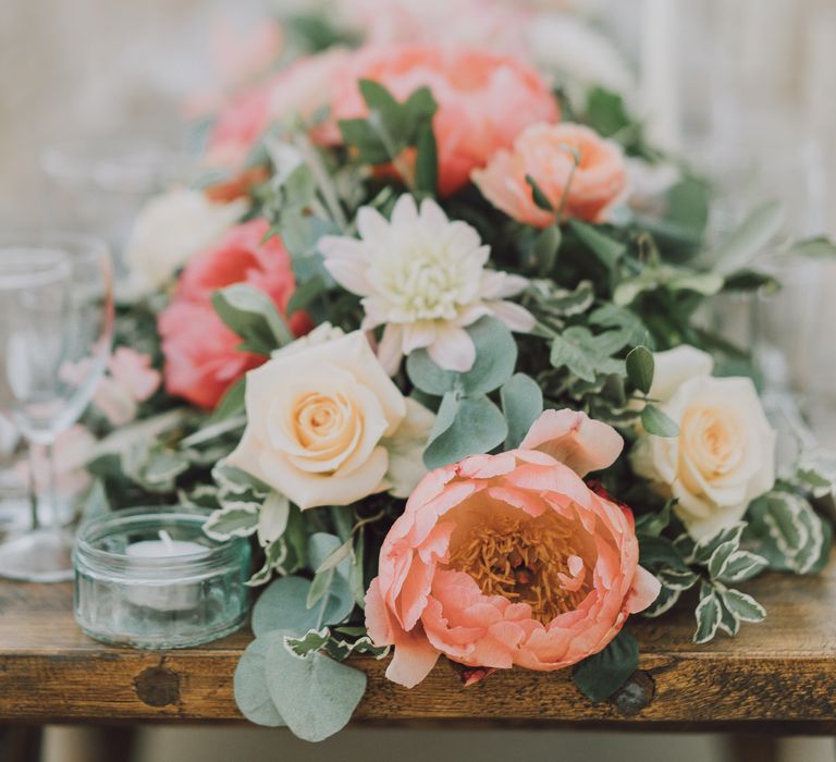 Pastel bouquet featuring pale orange blooms