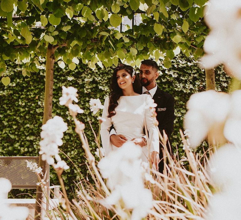 Intimate bride and groom portrait in the gardens 