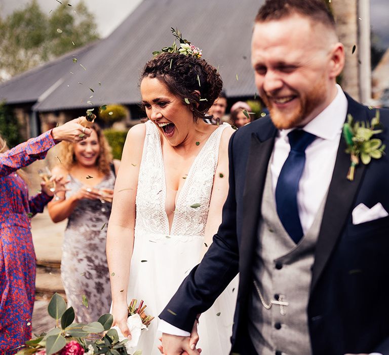 Confetti moment for bride and groom at Cripps Barn