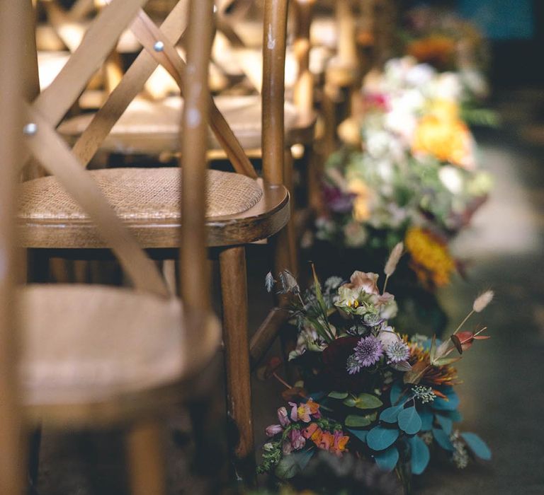 Beautiful wildflower aisle wedding decor 