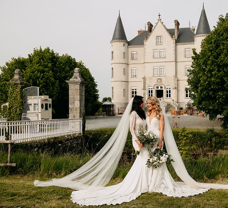 Brides look stunning in lace wedding dresses with trains and long veils 