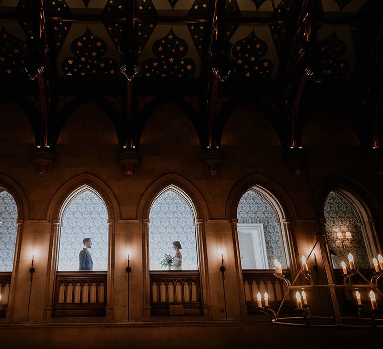 Bride and groom face each other at the incredible Maften Hall wedding venue 