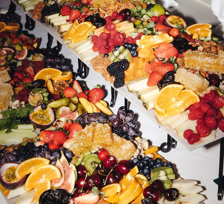 Iranian wedding custom with table of fruits and nuts