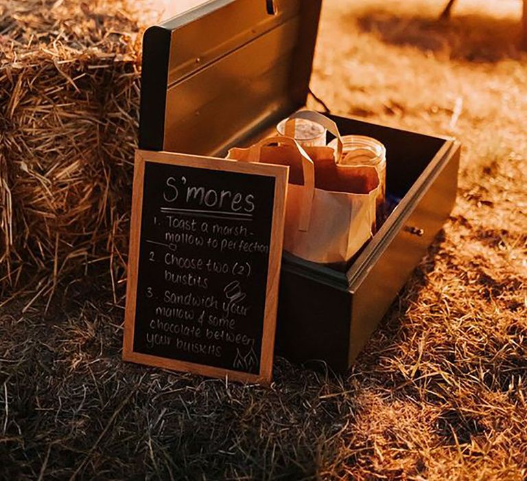 Outdoor firepit and s'mores station for guests 