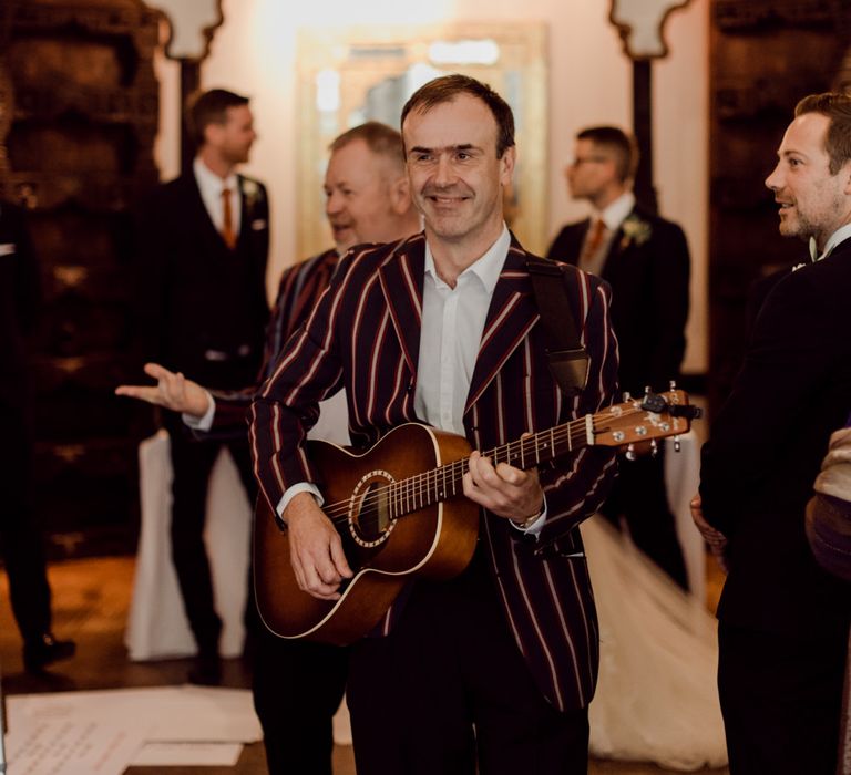 Wedding band during ceremony at Larmer Tree Gardens