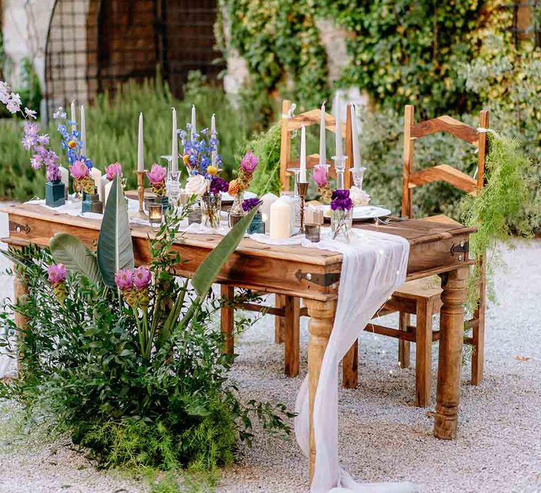 Beautifully decorated sweetheart table for bride and groom 