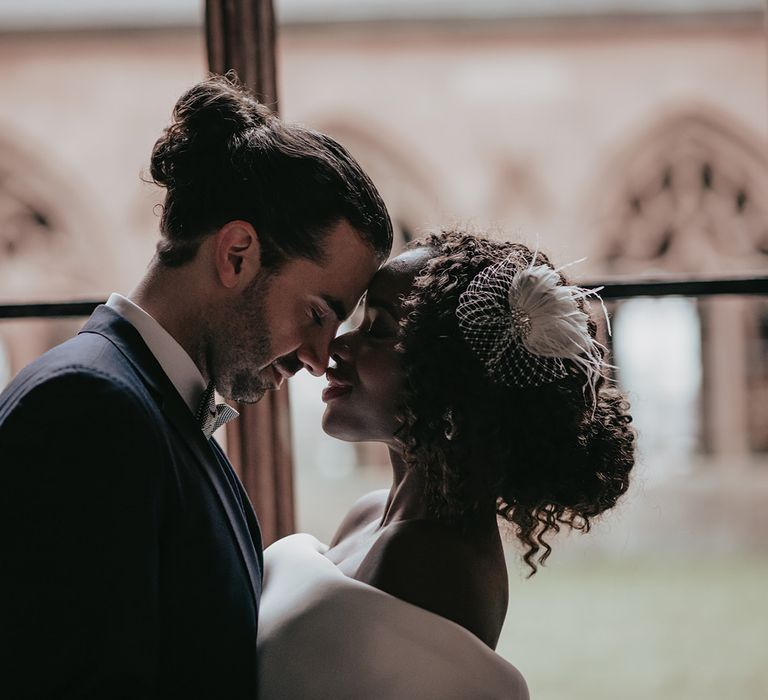 Bride & groom kiss after wedding ceremony