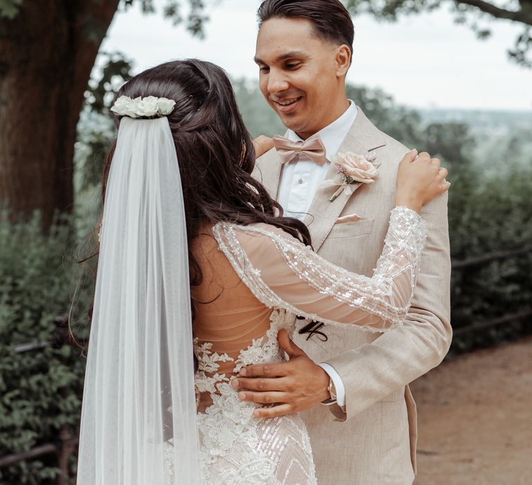 Bride & groom see one another for the first time on their wedding day