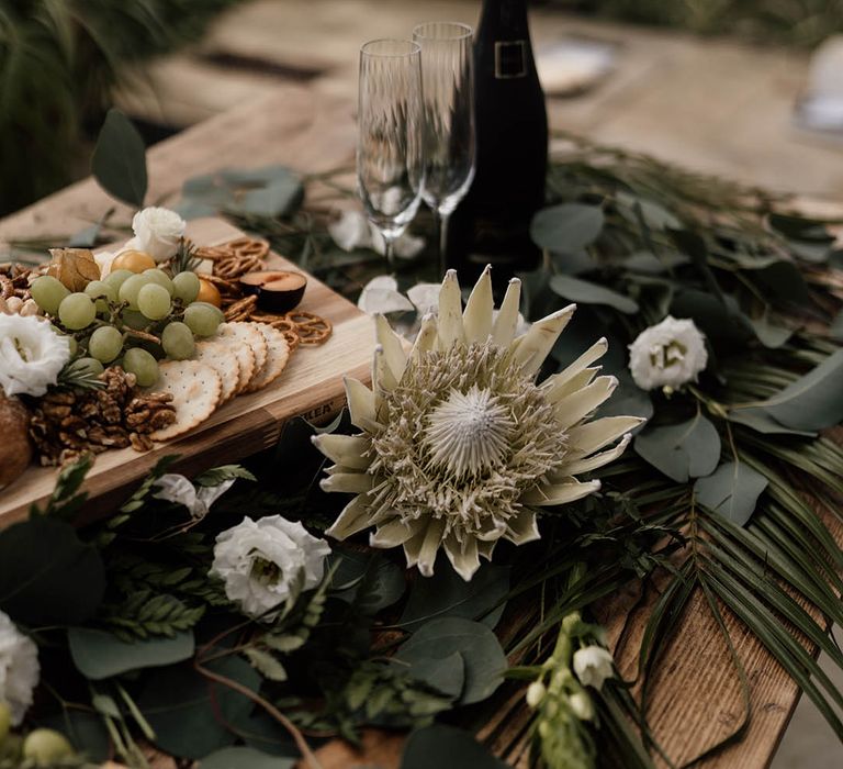 Grazing board decorated with Kind Protea wedding flower 