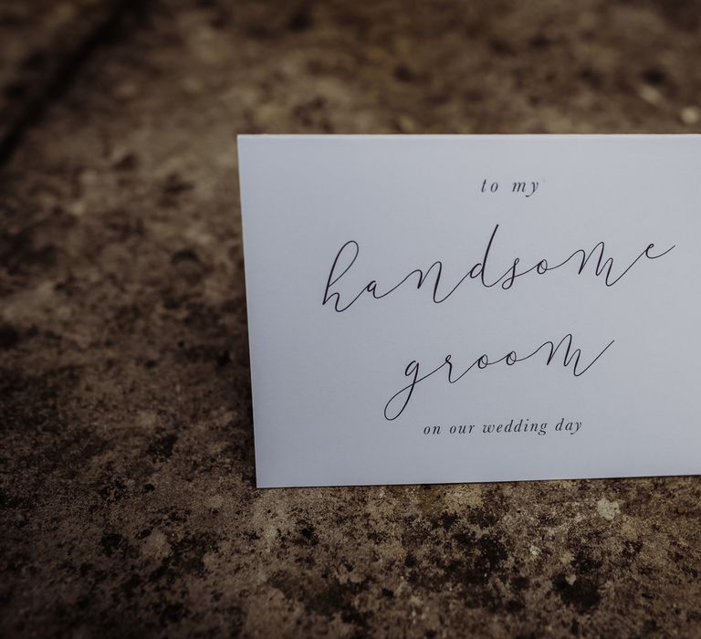 Wedding stationery reading 'to my handsome groom on our wedding day' in modern calligraphy