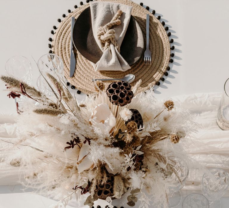 Boho luxe tablescape complete with pampas grass bouquet 