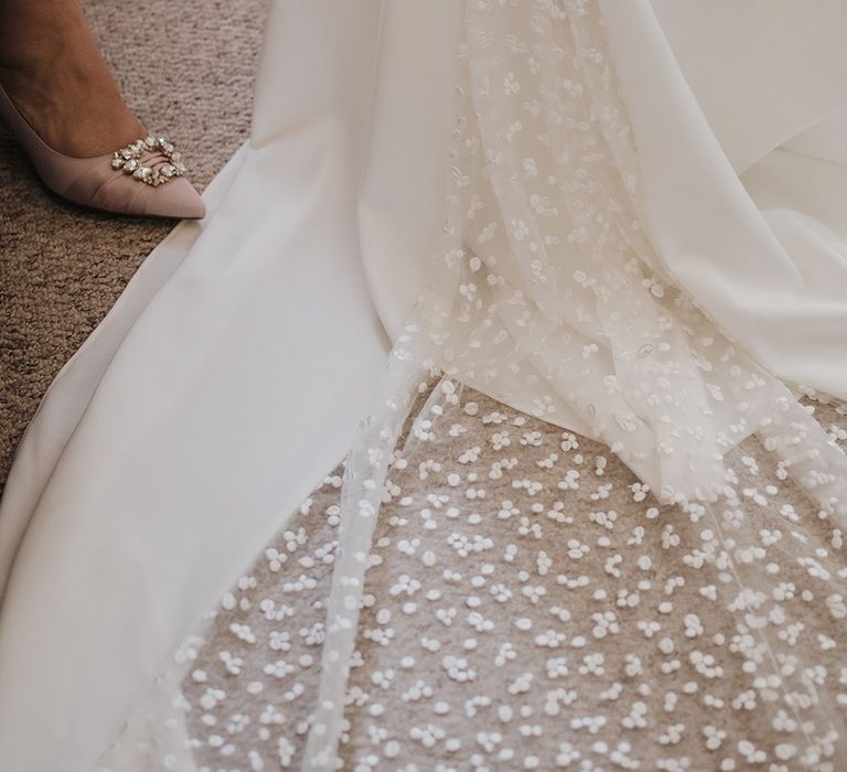 Veil worn by bride with embroidered dot design 