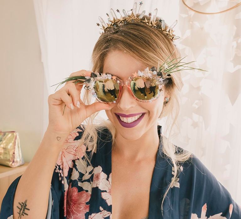 Spanish beach wedding with bride in fun iridescent sunglasses 