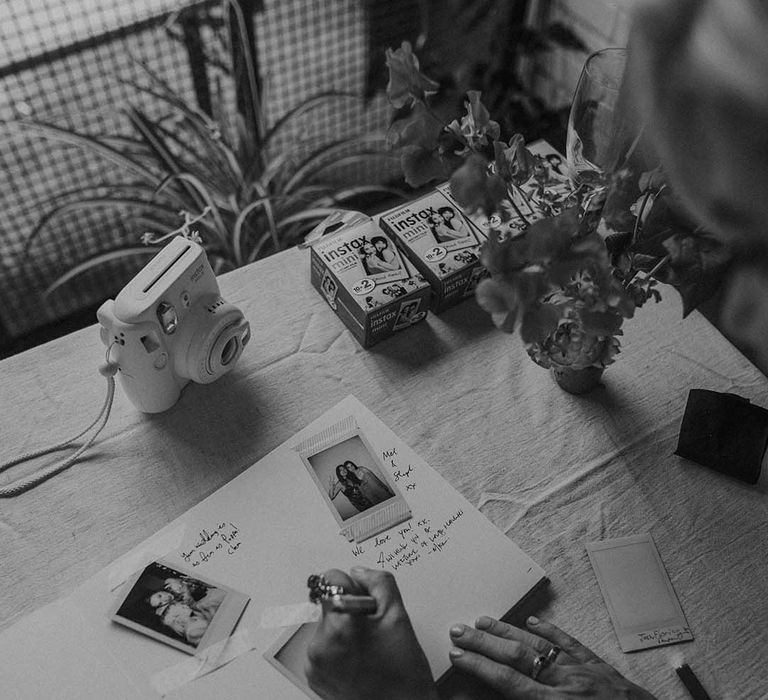 DIY wedding guestbook with Instax camera and polaroids at Hackney Studios